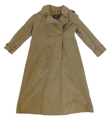 Lot 459 - A Burberrys beige Mackintosh, size unknown,...