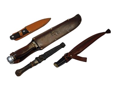 Lot 427 - A group of knives, to include a hunting knife...