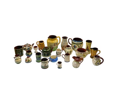 Lot 428 - A group of Torquay mottoware, to include jugs,...