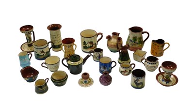 Lot 441 - A group of Devon mottoware, to include mugs,...
