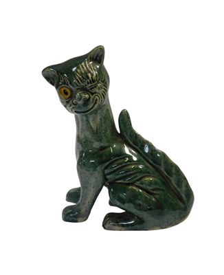 Lot 452 - An Aller Vale Devon pottery cat, in green...