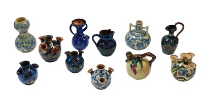 Lot 445 - A group of Torquay ware, each piece decorated...
