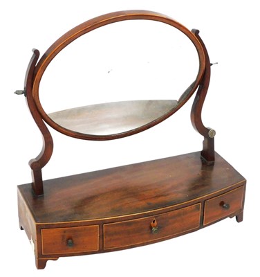 Lot 754 - A George III mahogany toilet mirror, with...