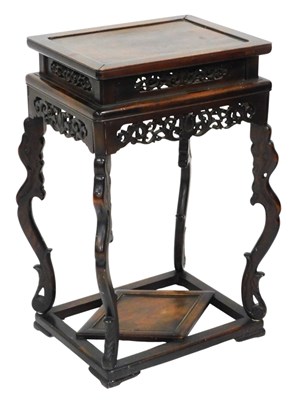 Lot 735 - A 19thC Chinese hardwood urn stand, of...