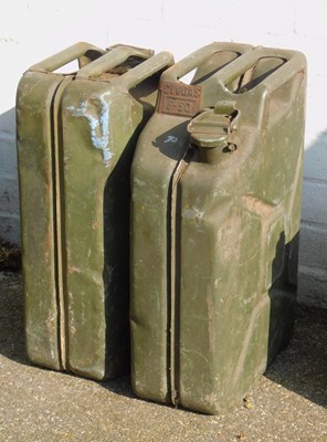 Lot 562 - Two military green painted jerry cans.