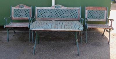 Lot 568 - A garden set, comprising a green painted cast...