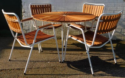 Lot 569 - A teak and white painted metal garden set,...