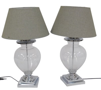 Lot 575 - A pair of contemporary glass table lamp...