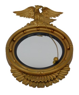 Lot 593 - A convex wall mirror, of circular form, with...