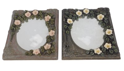 Lot 595 - A pair of 20thC mirrors, each decorated with...