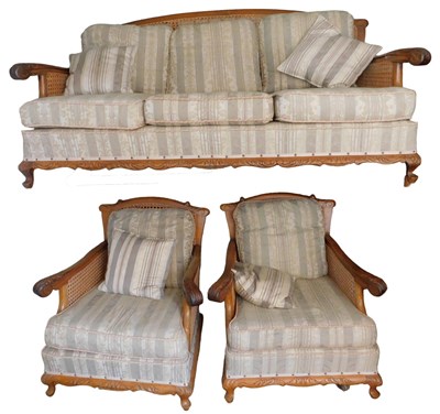 Lot 626 - A 20thC walnut framed bergere sofa suite,...
