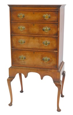 Lot 631 - A walnut chest in George II style, the top...