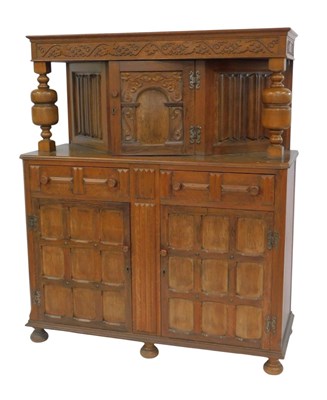 Lot 635 - A 20thC oak court cupboard, the top with a...