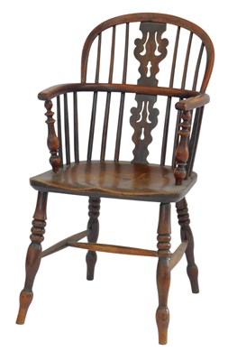 Lot 645 - A 19thC yew and elm Windsor chair, with a...