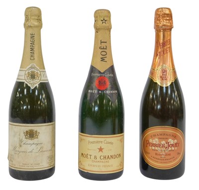 Lot 500 - Three bottles of Champagne, comprising Moet &...