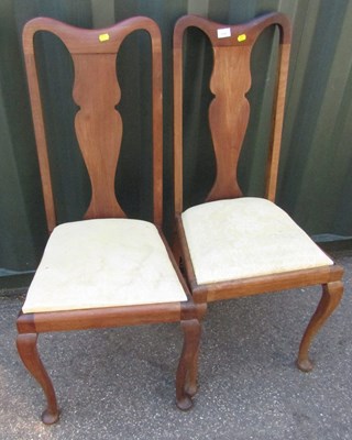 Lot 1121 - A pair of Queen Anne style dining chairs, with...