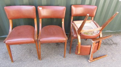Lot 1122 - A set of four leatherette and wooden dining...