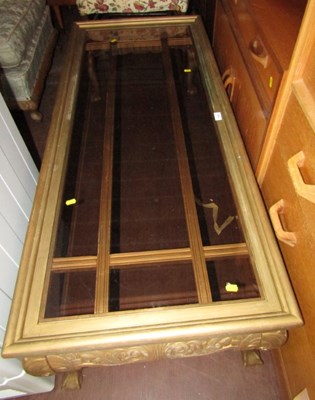 Lot 1125 - A Chinese inspired gilt decorated coffee table,...