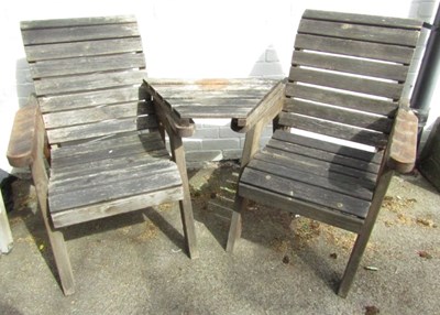 Lot 1131 - A wooden double garden seat, with table.