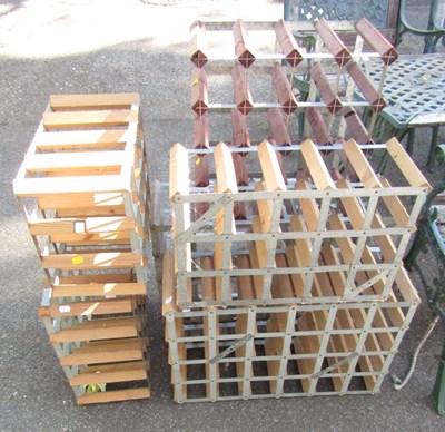 Lot 1135 - Six wine racks, metal and wooden.