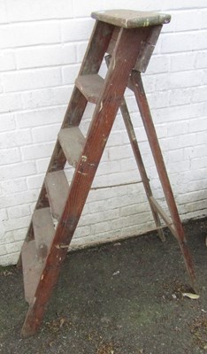 Lot 1137 - A small set of wooden A frame step ladders.