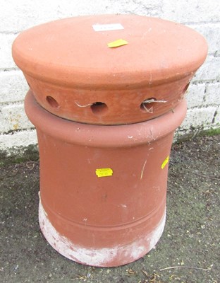Lot 1138 - A terracotta chimney pot.