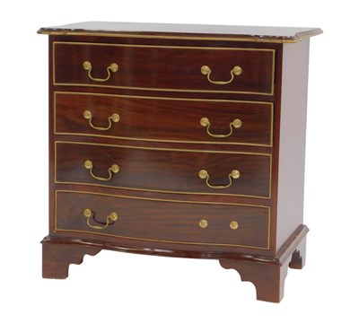 Lot 661 - A 20thC Continental walnut serpentine chest,...
