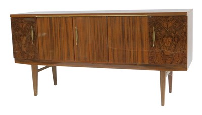 Lot 663 - A Beautility formica sideboard, the left-hand...
