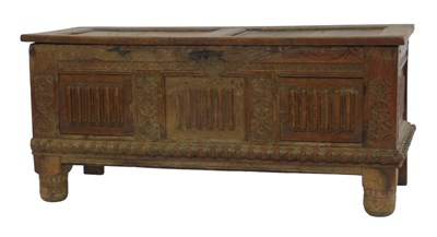 Lot 670 - An 18thC oak coffer, with a twin panelled...
