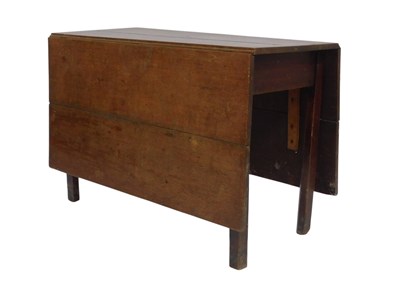 Lot 679 - A 19thC oak drop leaf table, on square legs,...