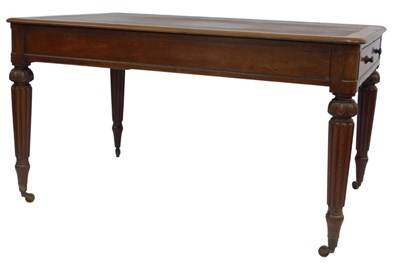 Lot 680 - A 19thC mahogany writing table, the top inset...