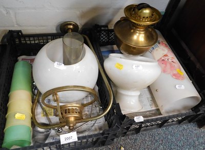 Lot 2007 - A hanging oil lamp, with glass shade and...