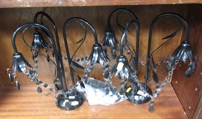 Lot 2009A - A pair of black three-sconce ceiling lights.
