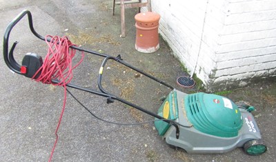 Lot 1147 - A Qualcast Turbo Trak 35 electric lawn mower.