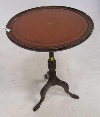 Lot 1148 - A mahogany wine table, with leather inset to...