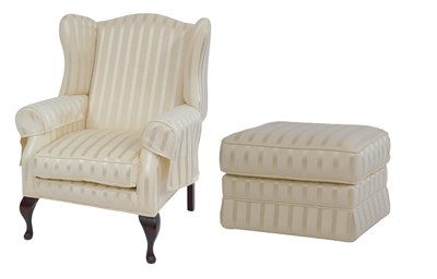 Lot 700 - A Laura Ashley wingback armchair, upholstered...