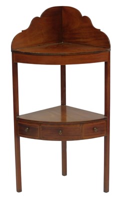 Lot 710 - A 19thC mahogany corner wash stand, with a...