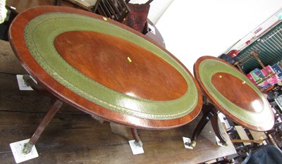 Lot 1161 - A mahogany coffee table, the oval top with a...