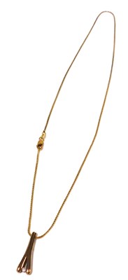 Lot 357 - A Solar 9ct gold and diamond pendant, of two...