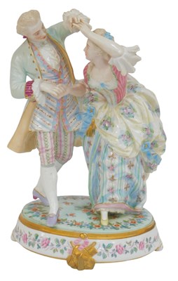 Lot 522 - A late 19thC porcelain figure group of an...