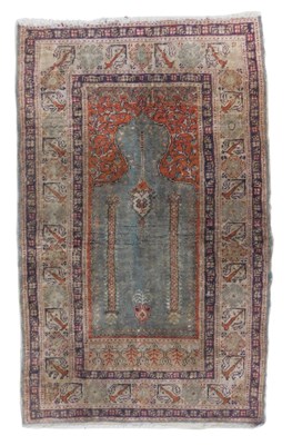 Lot 721 - An Afghan prayer rug, pale green ground, with...