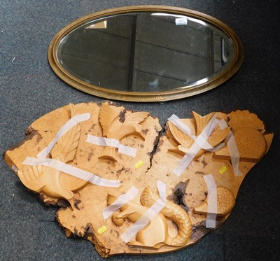 Lot 2077 - An oval gilt framed bevelled mirror, and a...