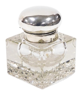 Lot 265 - An Edward VII cut glass inkwell, with a silver...