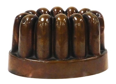 Lot 268 - A small Victorian copper jelly mould, of oval,...