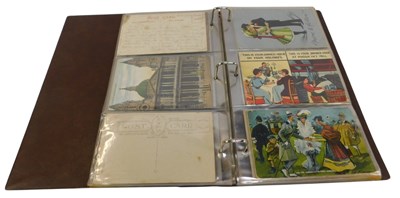 Lot 607 - An album containing various postcards, steam...