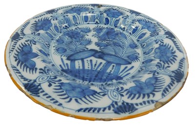 Lot 553 - A 19thC Delft blue and white dish, painted...