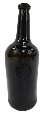 Lot 554 - An early 19thC green glass wine bottle,...