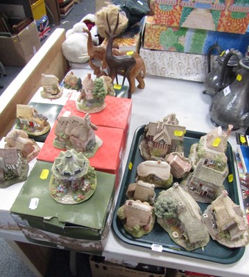 Lot 2101 - Lilliput Lane models, and two African hardwood...