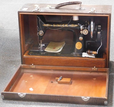 Lot 2117 - A cased manual sewing machine.