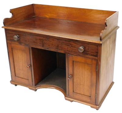 Lot 719 - An early Victorian mahogany washstand, with a...
